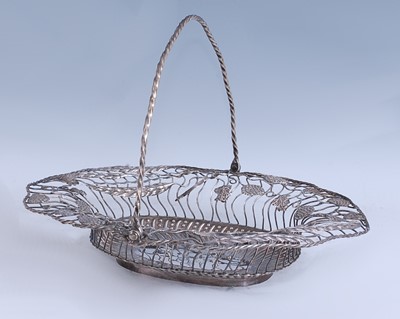 Lot 2105 - An early George III silver swing-handled...