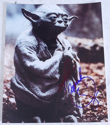 Lot 1174 - An album of signed film related photographs...