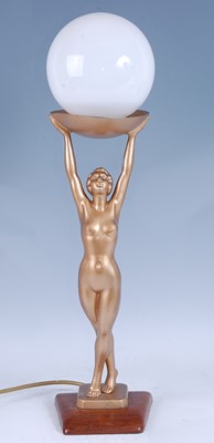 Lot 319 - An Art Deco gilt painted spelter figural table...