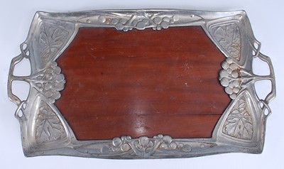 Lot 287 - A Urania Art Nouveau pewter and mahogany inset...