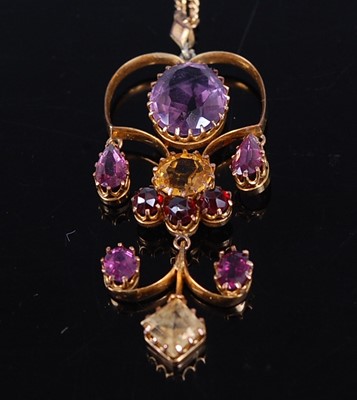 Lot 2214 - A yellow metal openwork multi-stone pendant,...