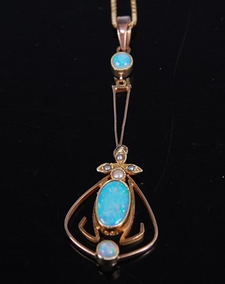 Lot 2215 - A yellow metal, opal and pearl fan shaped...