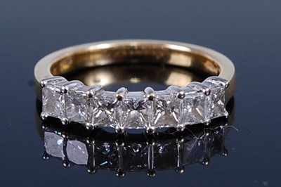 Lot 2220 - An 18ct yellow and white gold diamond half...