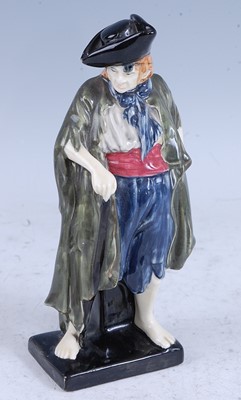 Lot 68 - A Royal Doulton pottery figure The Beggar,...