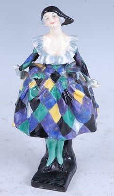 Lot 69 - A Royal Doulton pottery figure Harlequinade,...