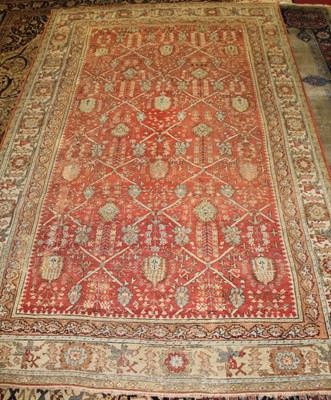 Lot 2442 - A Persian woollen Bakshaish carpet, the red...
