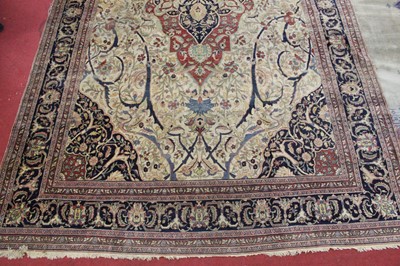 Lot 1380 - A Persian woollen Isfahan carpet, the central...