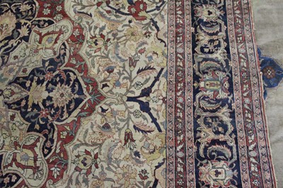 Lot 1380 - A Persian woollen Isfahan carpet, the central...
