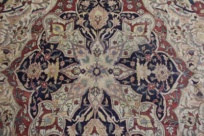 Lot 1380 - A Persian woollen Isfahan carpet, the central...