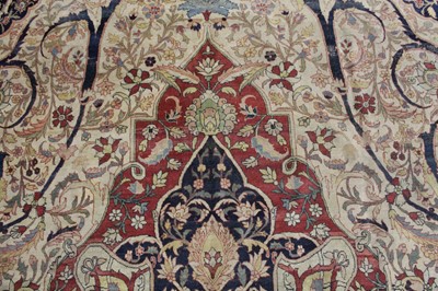 Lot 1380 - A Persian woollen Isfahan carpet, the central...