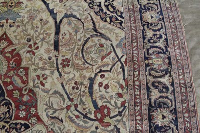 Lot 1380 - A Persian woollen Isfahan carpet, the central...