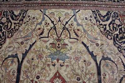 Lot 1380 - A Persian woollen Isfahan carpet, the central...