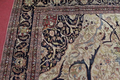 Lot 1380 - A Persian woollen Isfahan carpet, the central...