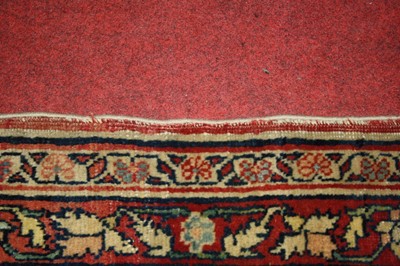 Lot 1380 - A Persian woollen Isfahan carpet, the central...