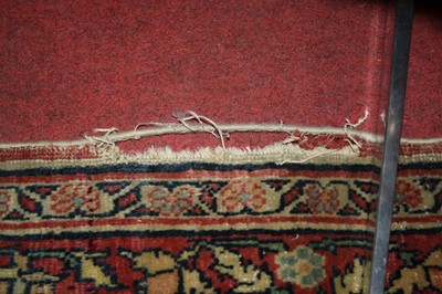 Lot 1380 - A Persian woollen Isfahan carpet, the central...