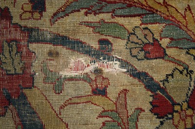 Lot 1380 - A Persian woollen Isfahan carpet, the central...