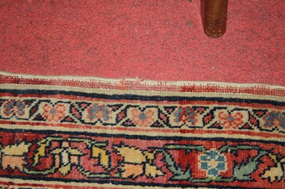 Lot 1380 - A Persian woollen Isfahan carpet, the central...