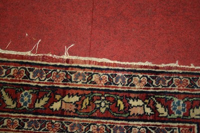Lot 1380 - A Persian woollen Isfahan carpet, the central...