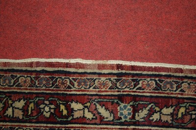 Lot 1380 - A Persian woollen Isfahan carpet, the central...