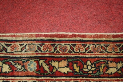 Lot 1380 - A Persian woollen Isfahan carpet, the central...