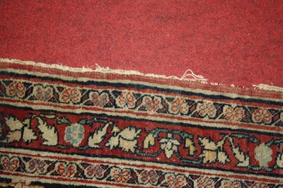 Lot 1380 - A Persian woollen Isfahan carpet, the central...