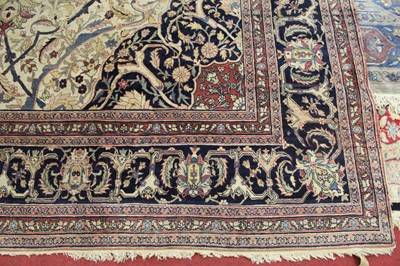 Lot 1380 - A Persian woollen Isfahan carpet, the central...