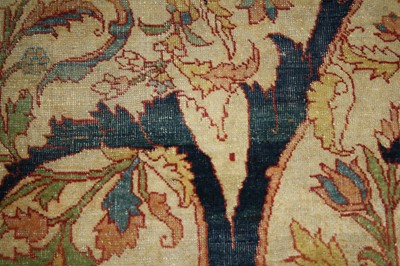Lot 1380 - A Persian woollen Isfahan carpet, the central...