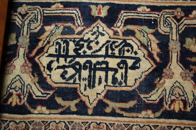 Lot 1380 - A Persian woollen Isfahan carpet, the central...