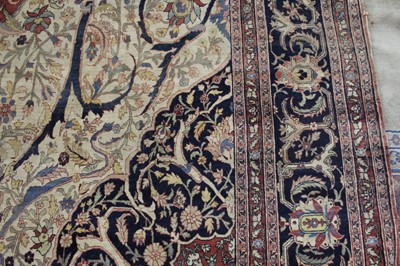 Lot 1380 - A Persian woollen Isfahan carpet, the central...