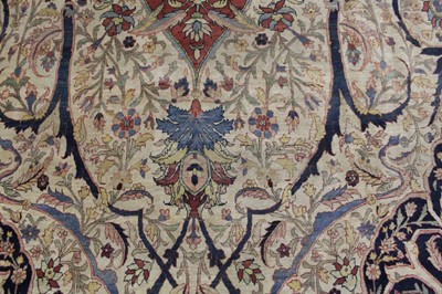 Lot 1380 - A Persian woollen Isfahan carpet, the central...
