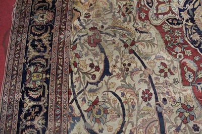 Lot 1380 - A Persian woollen Isfahan carpet, the central...