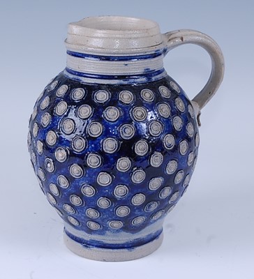 Lot 2061 - A late 17th century German Westerwald salt...