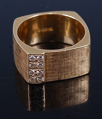 Lot 270 - A 1970s 18 carat gold fashion ring, having...