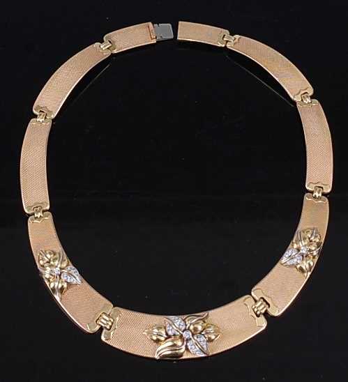 Lot 280 - An 18 carat gold and diamond point inset...