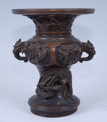 Lot 2319 - A far eastern bronze vase, the flaring rim...