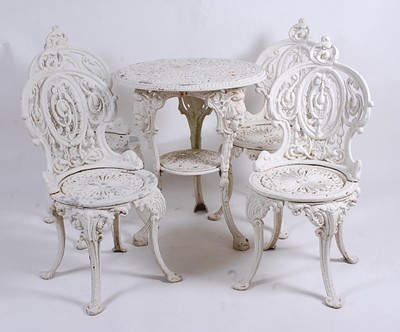 Lot 2497 - A Victorian cast iron garden patio set,...