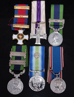 Lot 216 - A collection of twenty five miniature...