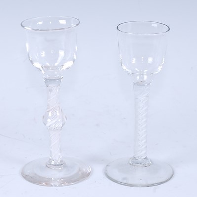 Lot 1038 - A circa 1765 wine glass, the ogee bowl above a...