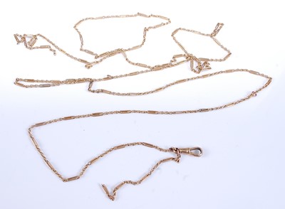 Lot 2553 - A yellow metal trombone link long guard chain,...