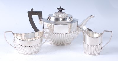 Lot 1098 - An Edwardian silver three-piece tea service,...