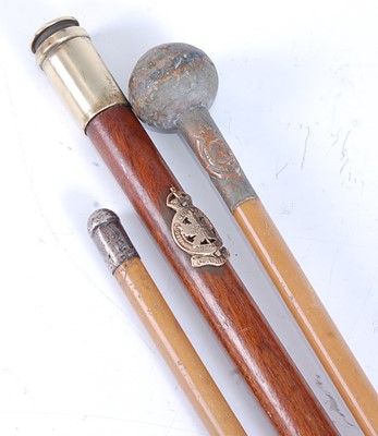 Lot 69 - A WW II swagger stick, having an applied...