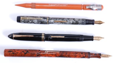 Lot 82 - Four vintage pens, comprising a boxed Unique...