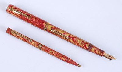 Lot 70 - A Waterman 94 Rose Ripple fountain pen and...