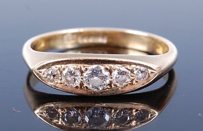 Lot 438 - An 18ct yellow gold diamond five stone half...