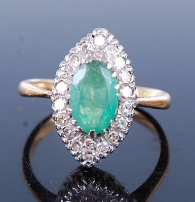 Lot 2625 - A yellow and white metal, emerald and diamond...