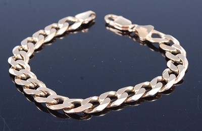 Lot 2607 - A modern yellow flat curblink bracelet,...