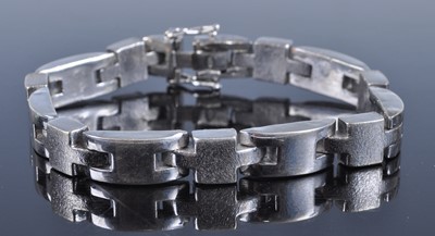 Lot 2611 - A modern white metal textured and plain...