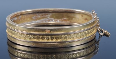 Lot 2614 - An early 20th century yellow metal hinged...