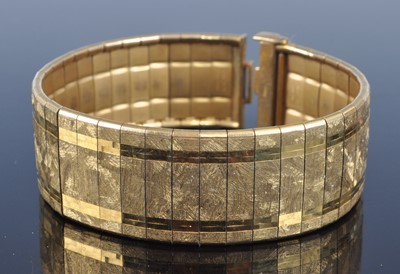 Lot 2616 - A 9ct gold finely textured bracelet with...
