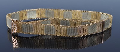 Lot 2619 - A 9ct two-colour gold meshlink bracelet, with...